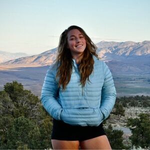 Women’s pinion down pull over light blue xl